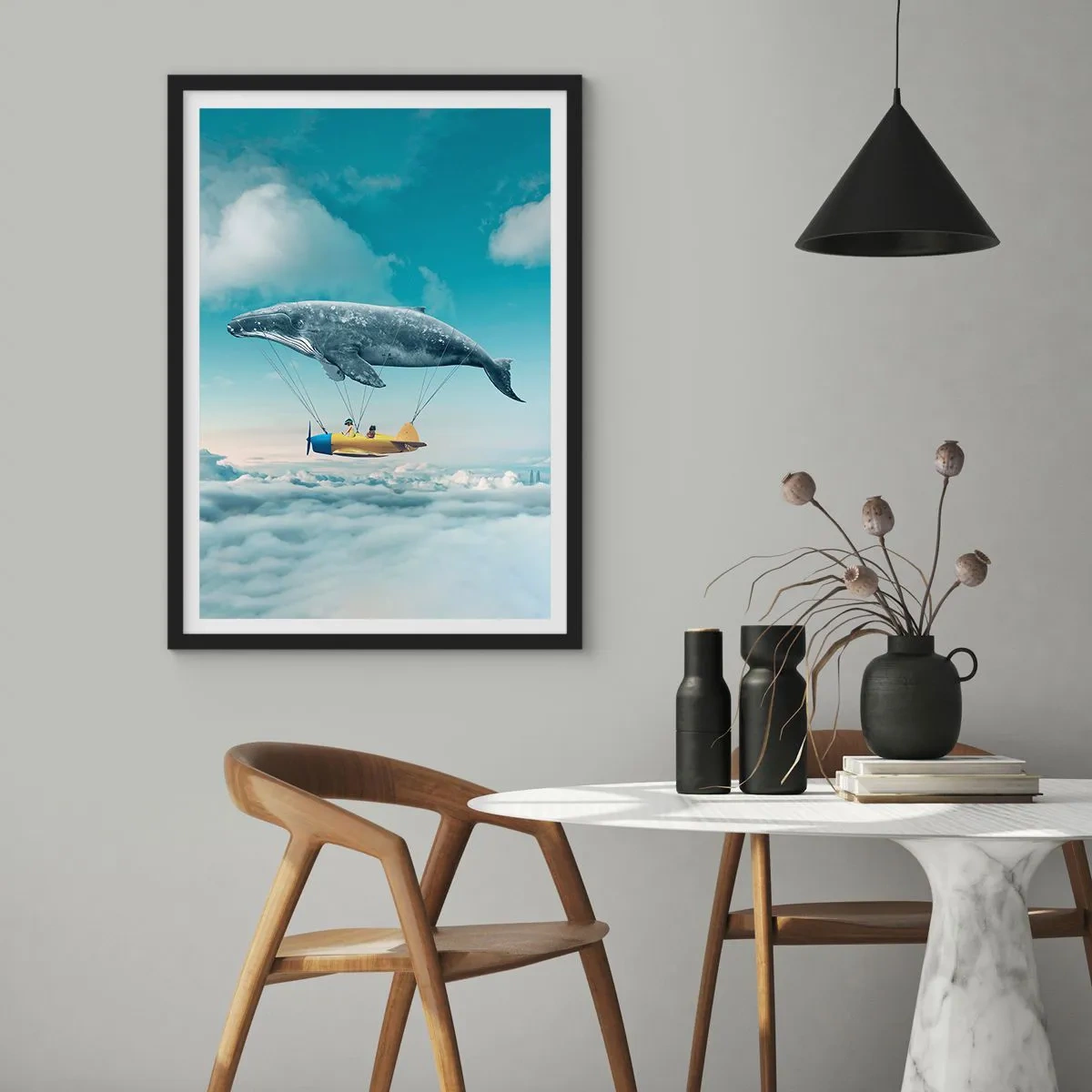 Poster in een zwarte lijst - Een fantastisch beeld van een walvis die een vliegtuig boven de wolken tilt. - 50x70cm - Waarom niet? - Moderne wanddecoratie voor woonkamer en slaapkamer ARTTOR