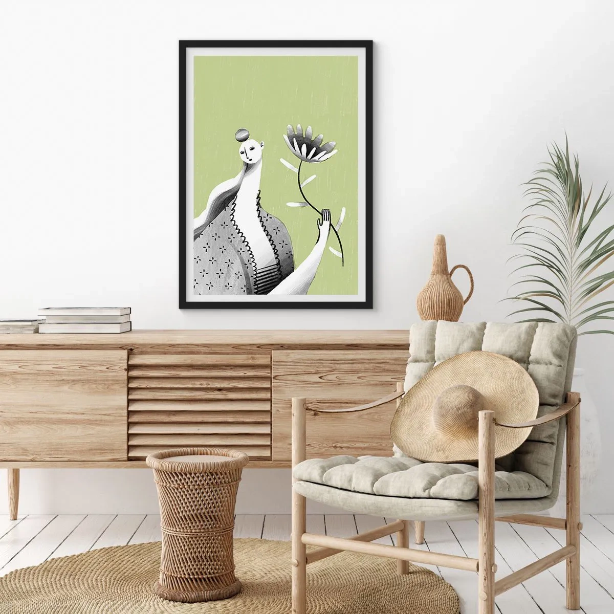 Poster in een zwarte lijst - Minimalistische vrouw die een bloem vasthoudt op een groene achtergrond - 50x70cm - Modernistisch portret – met een bloem in de hand - Moderne wanddecoratie voor woonkamer en slaapkamer ARTTOR