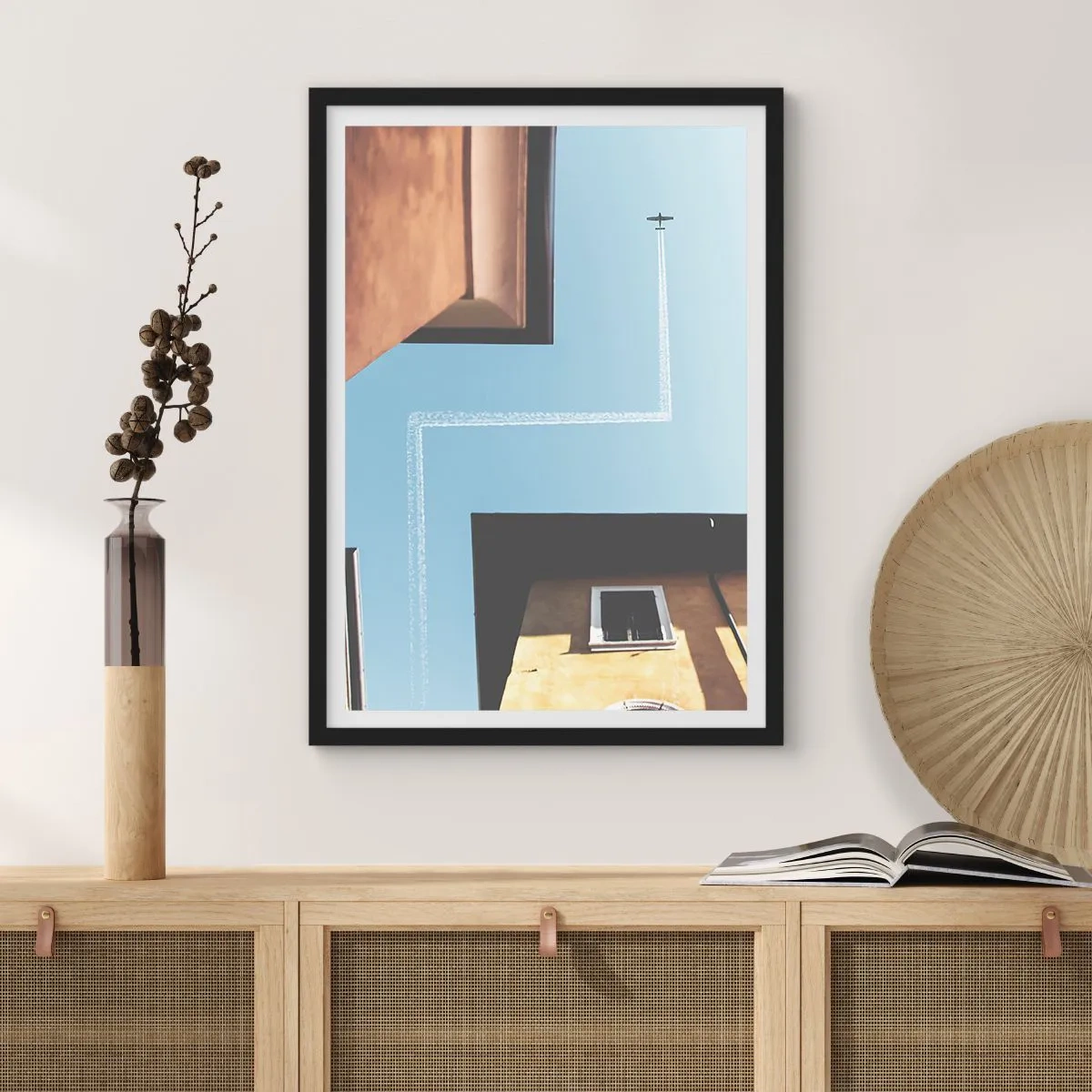 Poster in een zwarte lijst - Perspectief van gebouwen met een vliegtuig en een ongewoon pad in de lucht - 50x70cm - Boven het doolhof van de stad - Moderne wanddecoratie voor woonkamer en slaapkamer ARTTOR